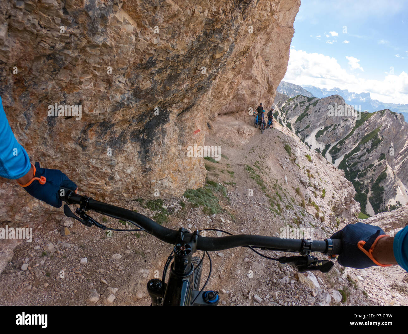 Three men mountain biking, Fanes-Sennes-Braies National Park, Dolomites, Trentino, South Tyrol, Italy Stock Photo