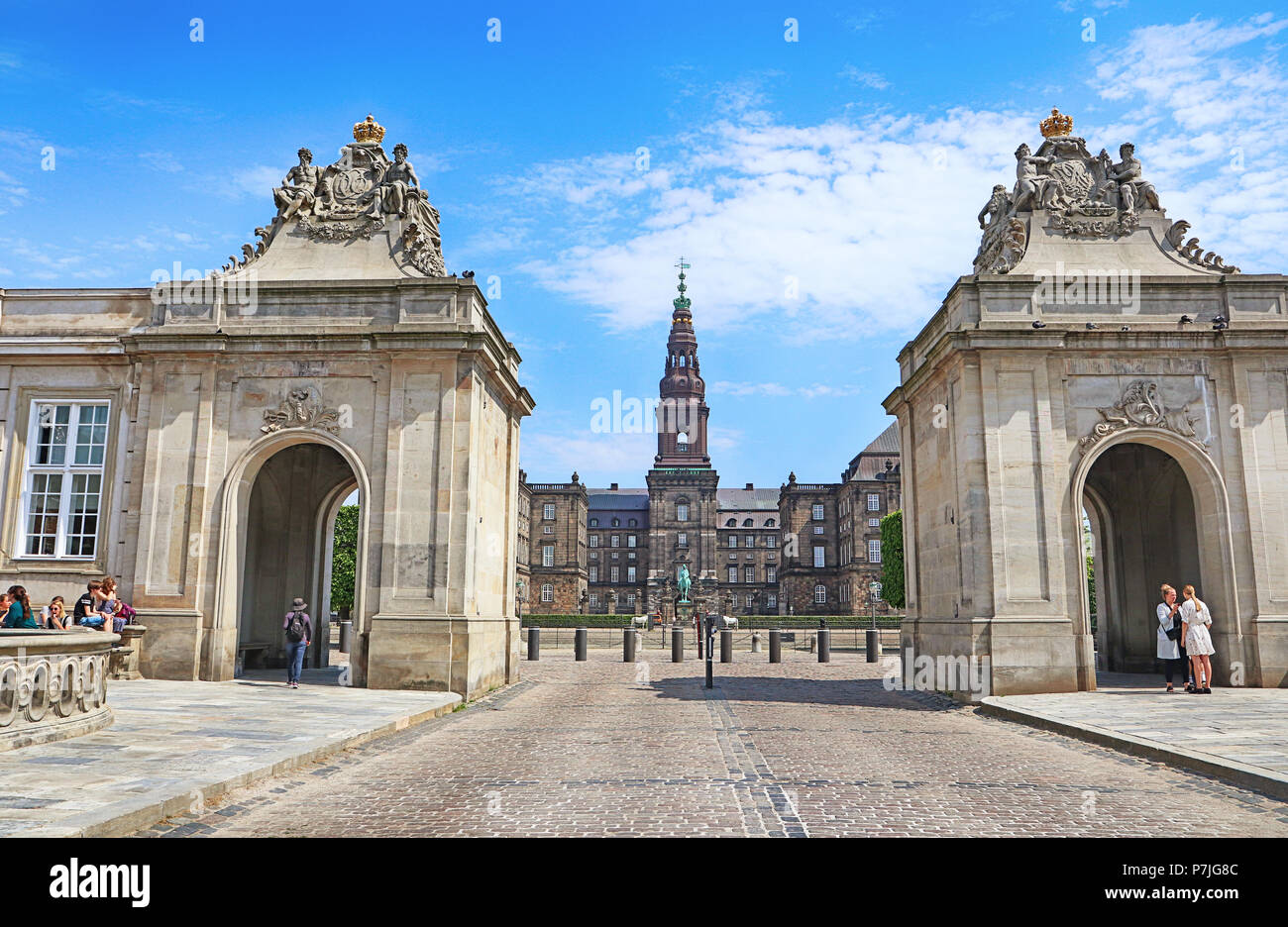 COPENHAGEN, DENMARK - MAY 17, 2018 Entrance to Christianborg Palace,house of the Danish Parliament, through the cobbled Marble Bridge over Frederiksho Stock Photo