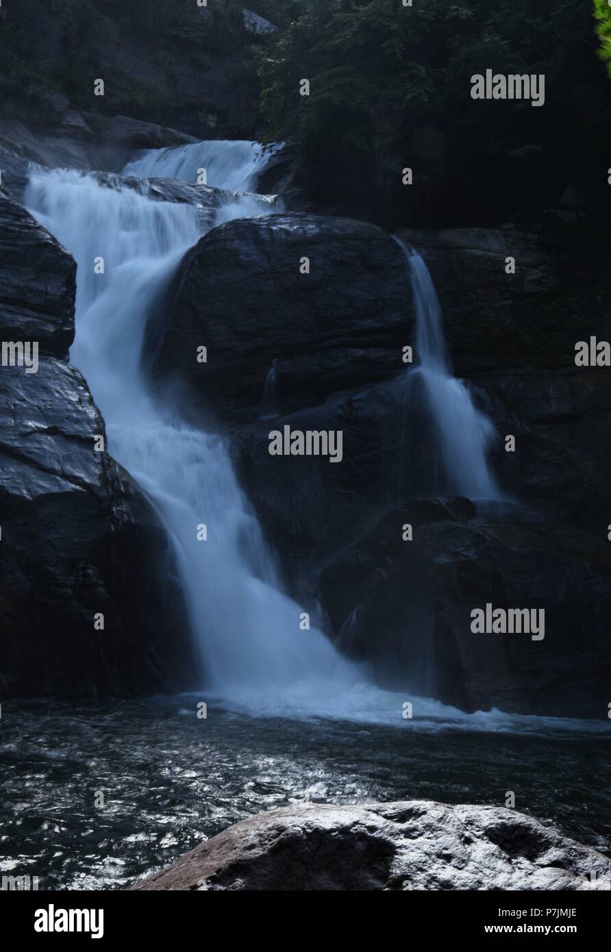 Dazzling views of Meenmutty Waterfalls near Ponmudi Hill Station