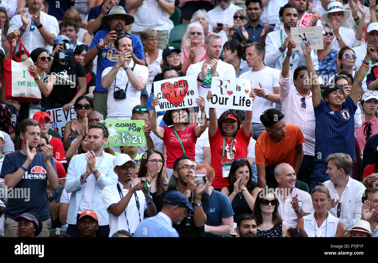 Roger Federer fans in the crowd on centre court on day five of the  Wimbledon Championships at the All England Lawn Tennis and Croquet Club,  Wimbledon Stock Photo - Alamy