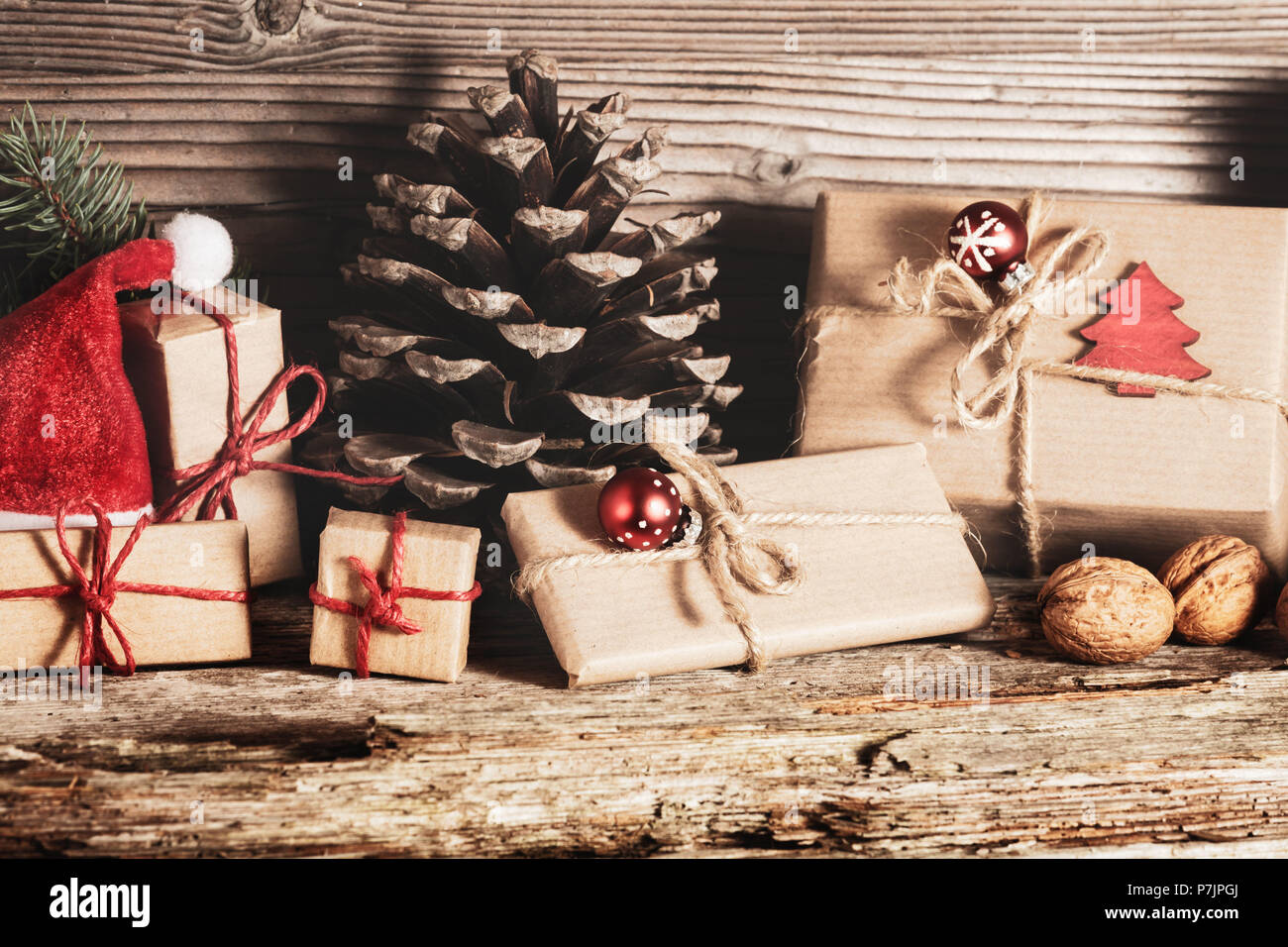 Christmas decoration and gifts on wood Stock Photo - Alamy