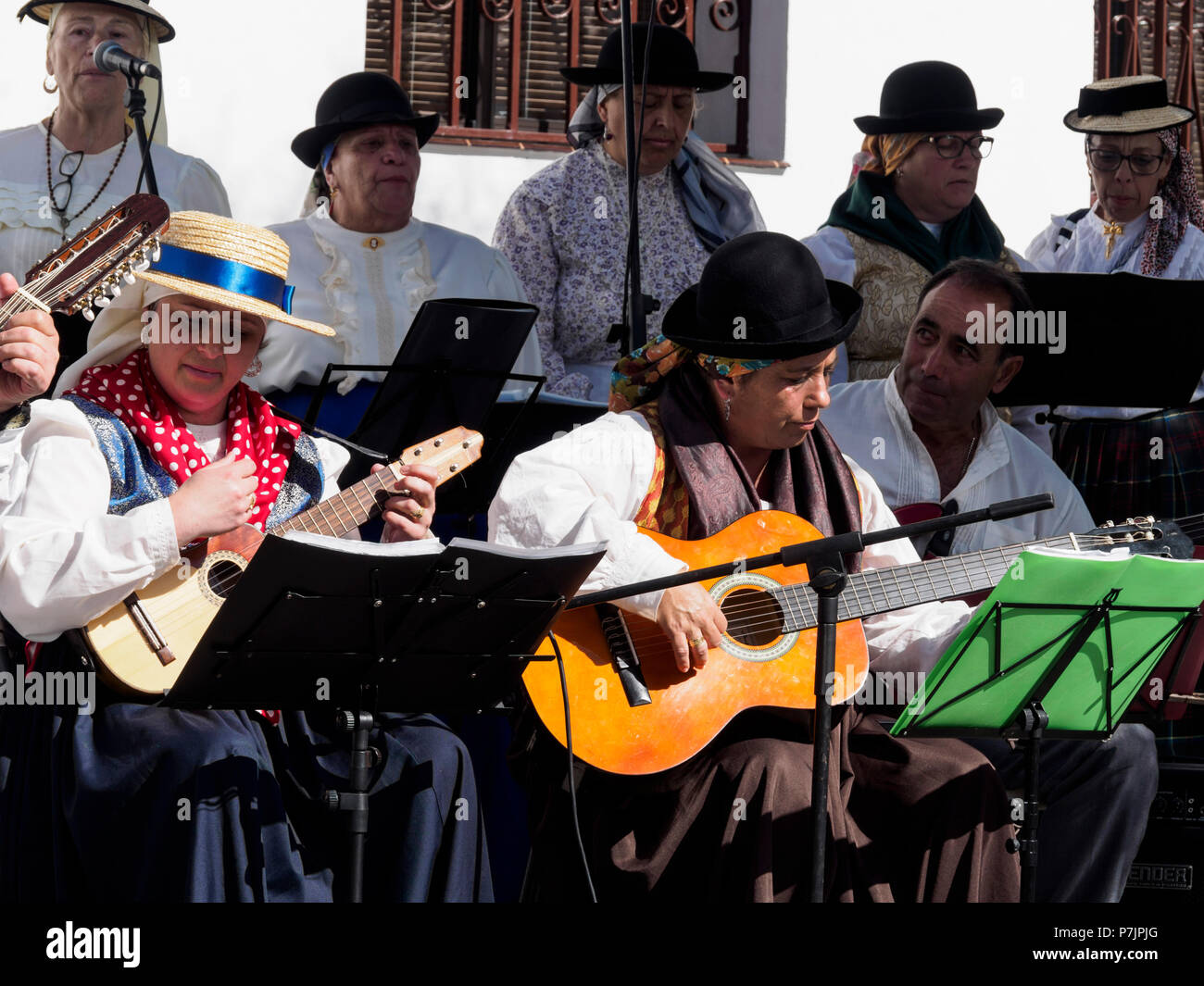 Tenerife, Canary Islands - Santiago del Teide. Traditional folk band playing Canarian music. Stock Photo
