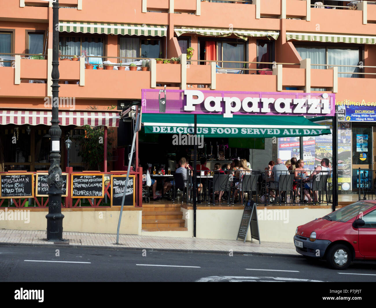 Tenerife, Canary Islands - Puerto Santiago. Arena beach front. Paparazzi restaurant. Stock Photo