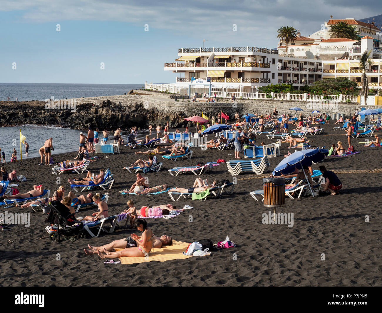 Tenerife, Canary Islands - Puerto Santiago. Arena beach with black lava sand. Stock Photo