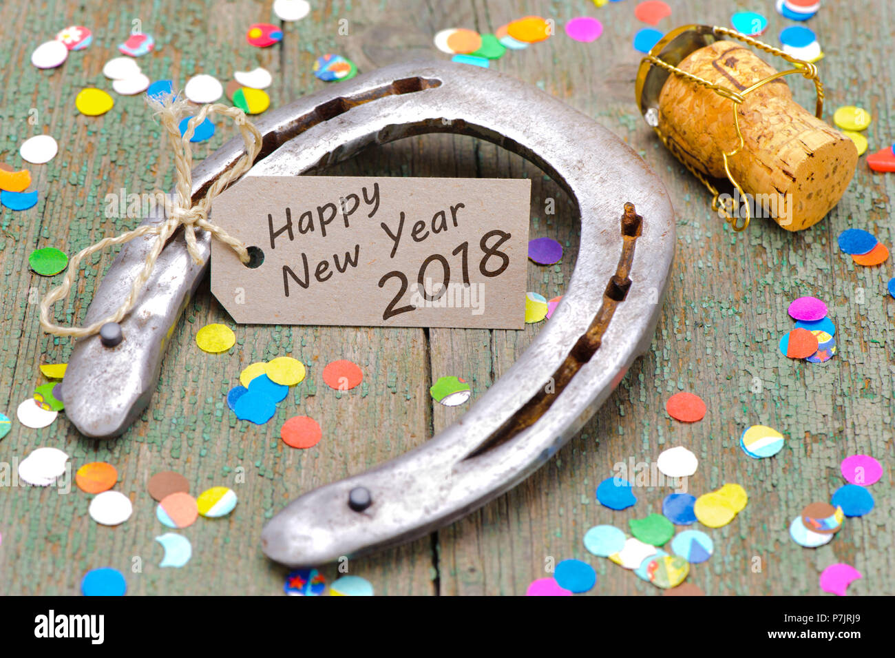 Horseshoe with Happy New Year wishes 2018 Stock Photo