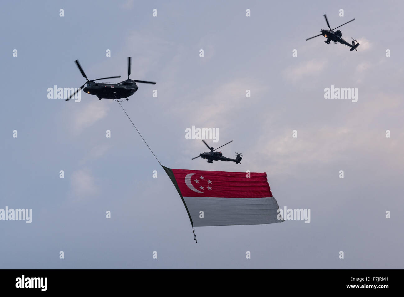 Full rehearsal, National Day celebrations, anniversary of Singapore's independence on August 9, army helicopters displaying national colours above Marina Sands Bay Stock Photo