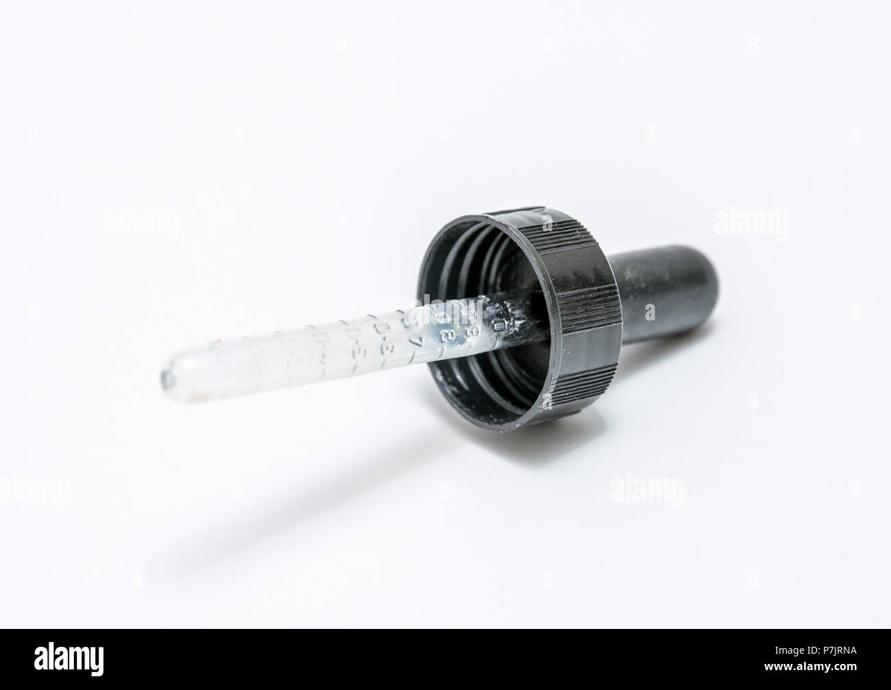 Medicine Dropper in white background Stock Photo Alamy