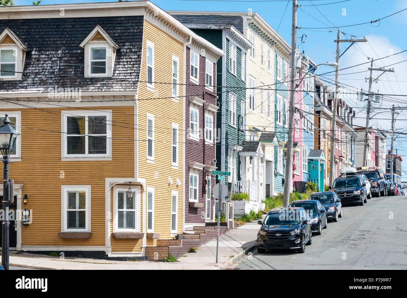 Jellybean Row or colourful houses on the corner of Gower Street and Prescott Street in St John's, Newfoundland Stock Photo