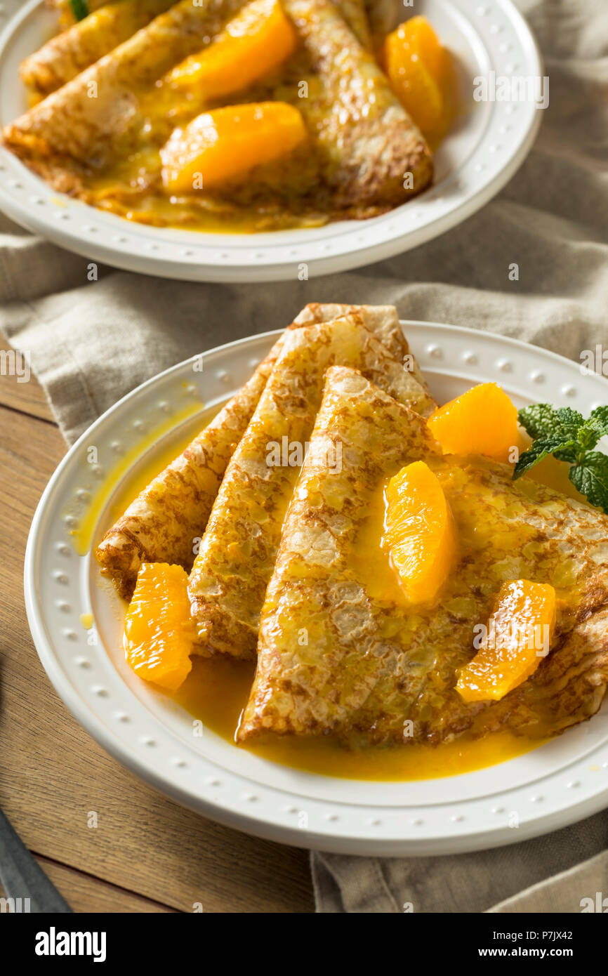 Sweet Homemade Orange Crepes Suzette for Breakfast Stock Photo