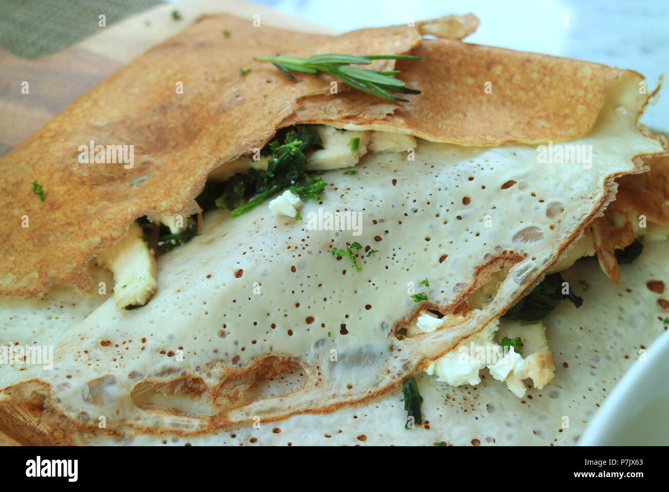 Close up of classic French savory crepe stuffed with spinach, chicken and cheese Stock Photo Alamy