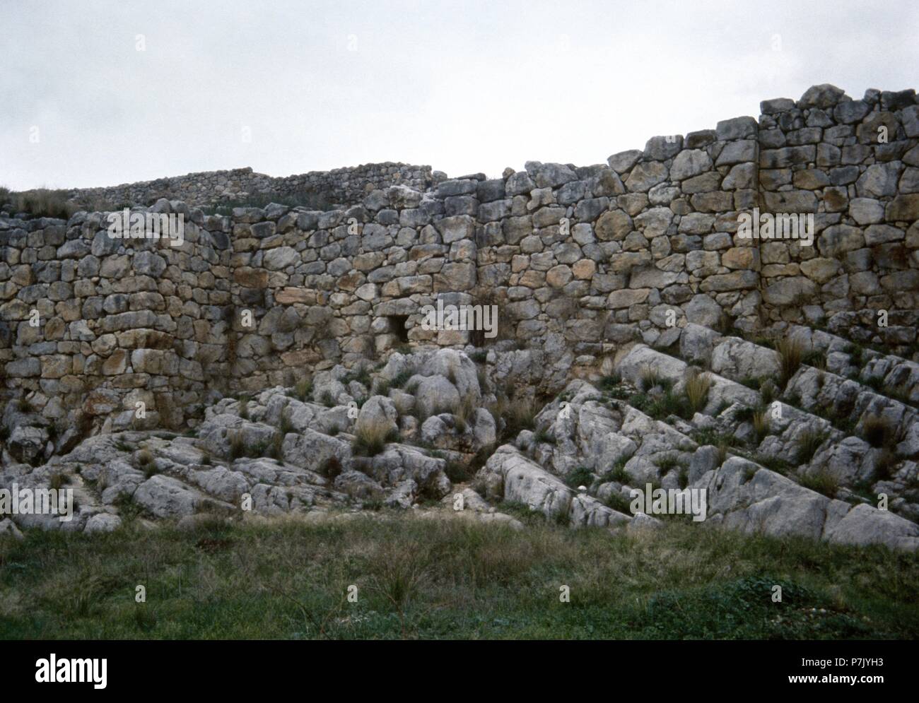 Tiryns, Greece. Archaeological Site. Mycenaean citadel. Cyclopean walls, 1400-1200 BC. Constructed of massive, irregular and limestone blocks. 7-10 meters thick. Argolis. Stock Photo