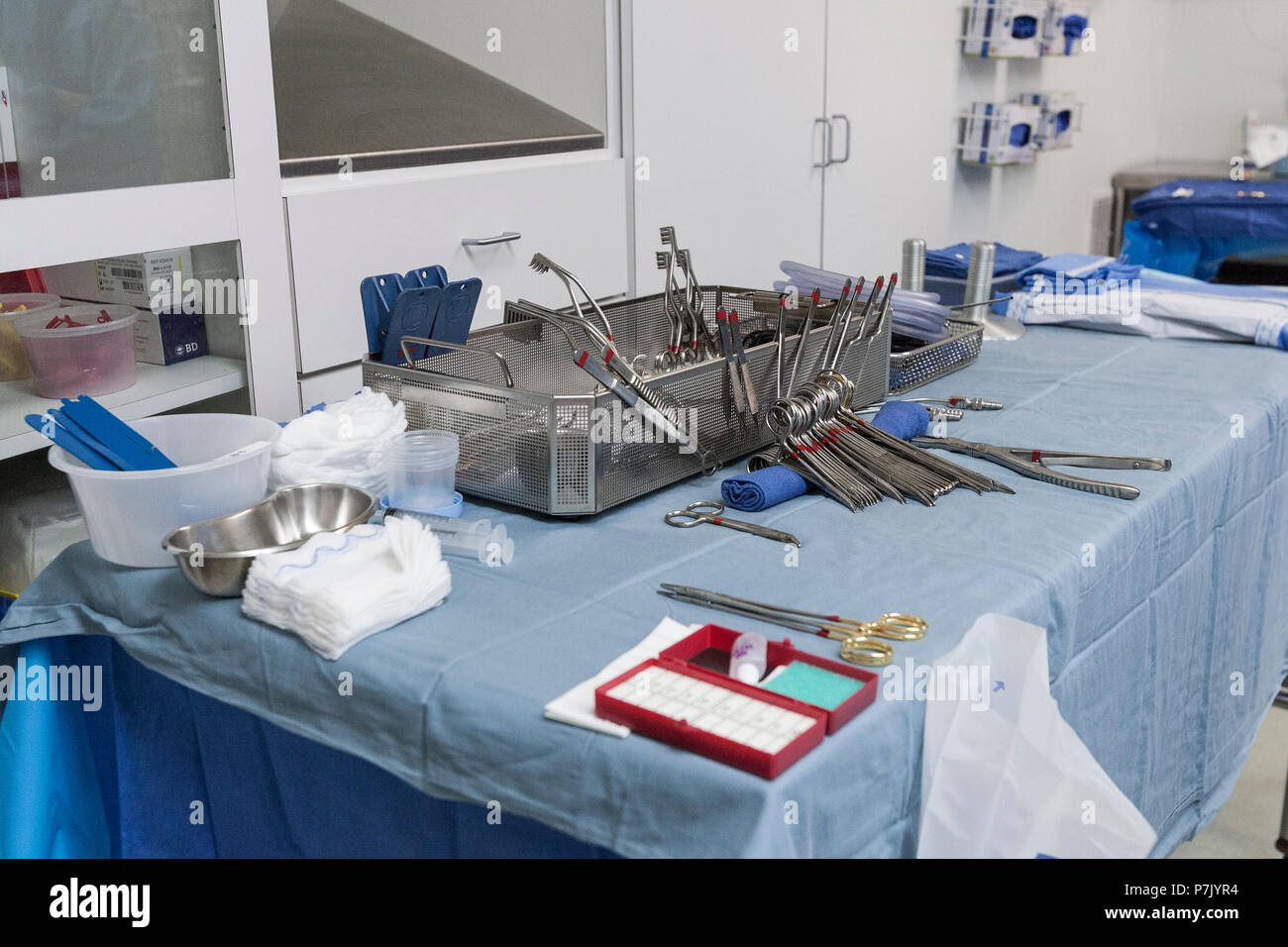 Surgical Instruments On Table Prior To Surgery Stock Photo