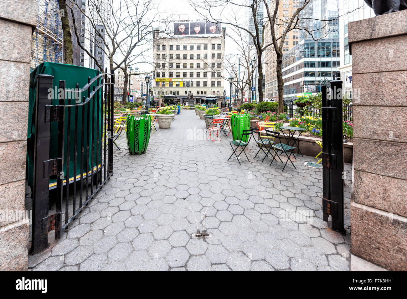 New York City, USA - April 7, 2018: Street view of urban NYC Herald Square Midtown with Greeley Square Park, open gate, nobody by korea town koreatown Stock Photo