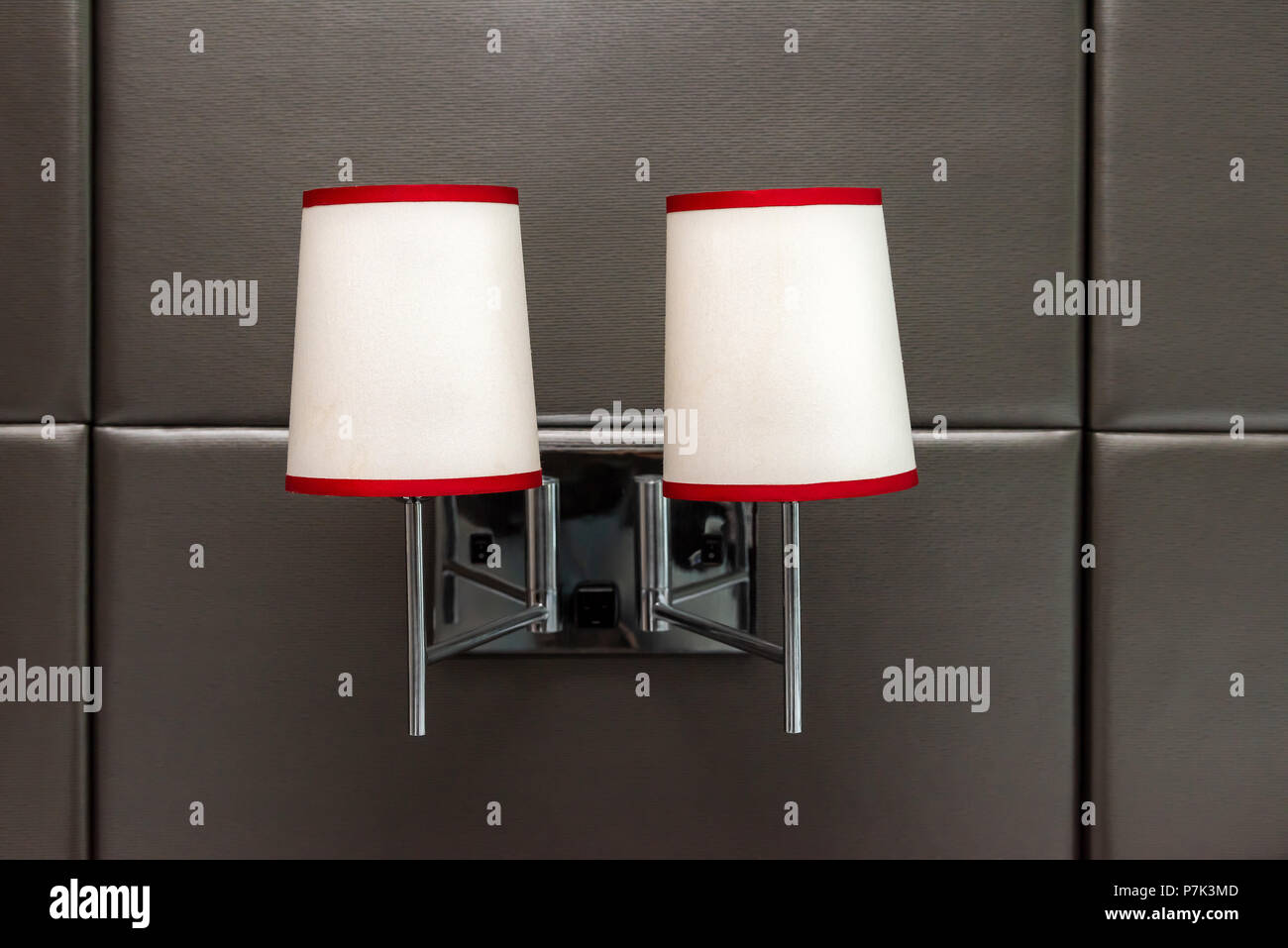 Two Retro White And Red Lamps Closeup In Hotel Room Bedroom