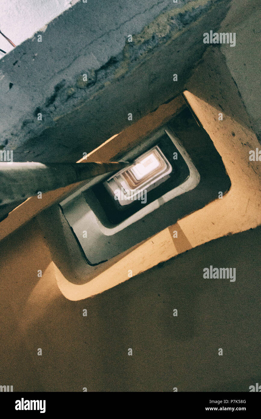 Dangerous spiral stairs in a worn building Stock Photo Alamy