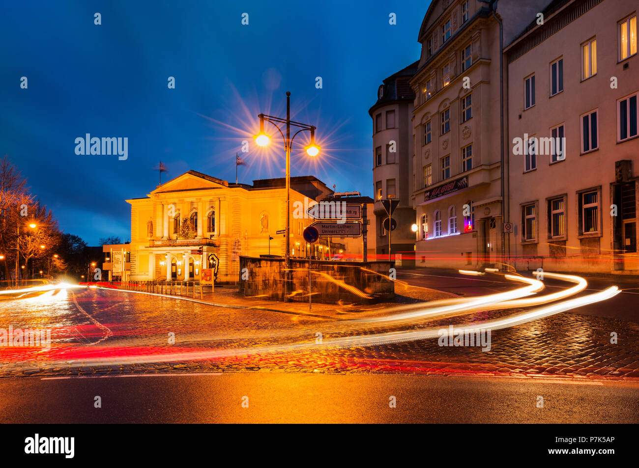 Germany, Saxony-Anhalt, Halle (Saale), at the opera, dusk, light tracks of moving cars Stock Photo