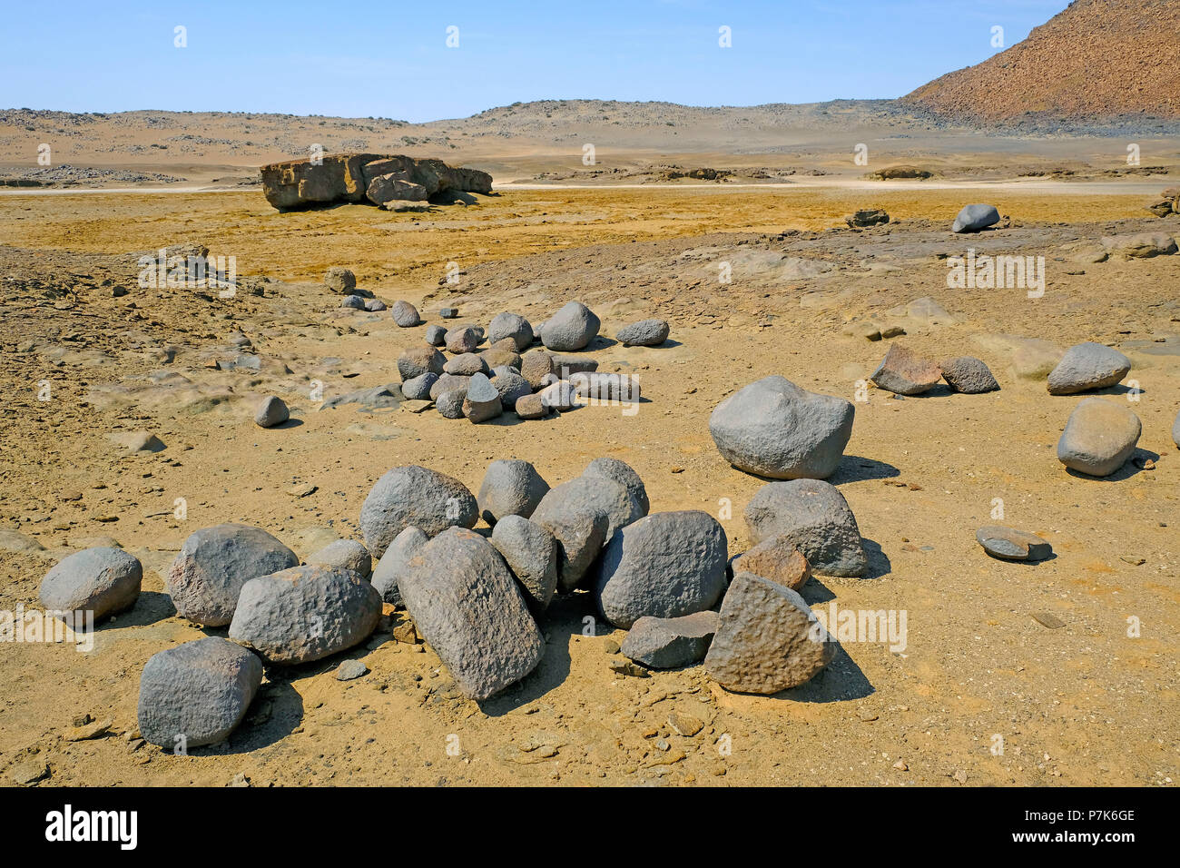 eroded, spherical stones in crater of Messum, Dorob National Park in Namibia Stock Photo