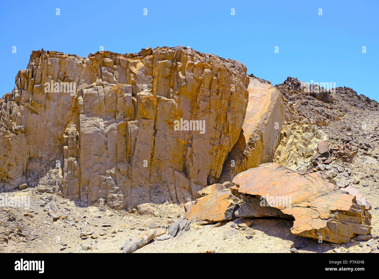 rugged, highly eroded rock landscape on the Ugab track in the Dorob National Park in Namibia Stock Photo