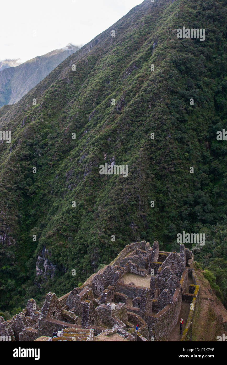 Ancient stone ruins of an Inca town on the Inca Trail in the Andes ...