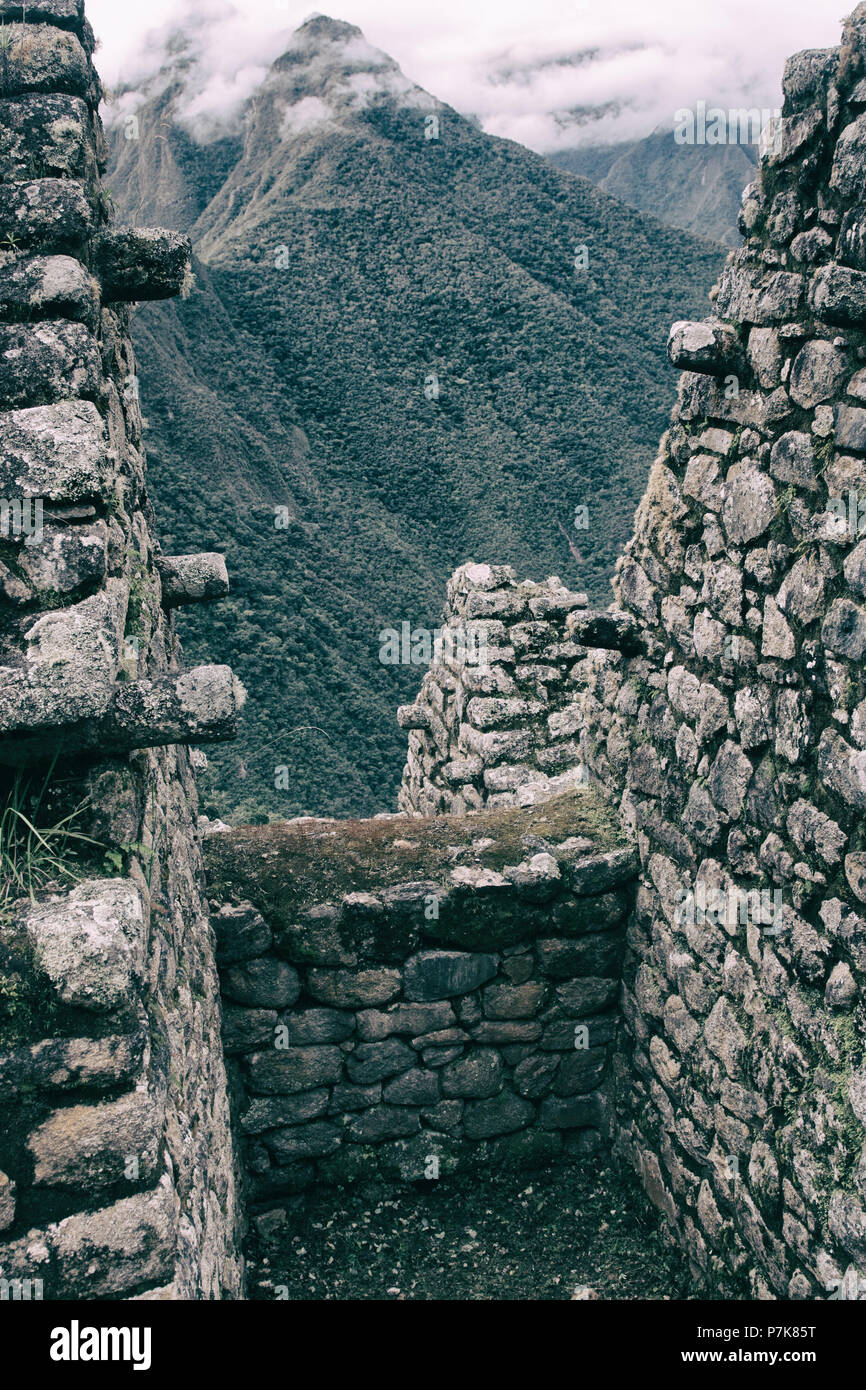 Ancient stone ruins of an Inca town on the Inca Trail in the Andes ...