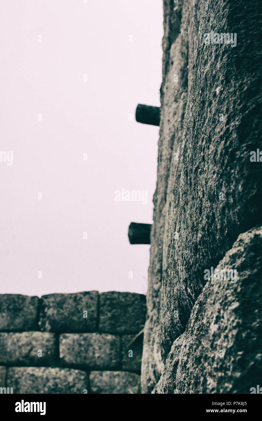 Stone magical ancient ruins along the paved path Inca Trail to Machu ...