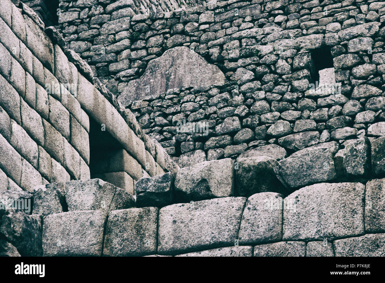 Stone magical ancient ruins along the paved path Inca Trail to Machu ...