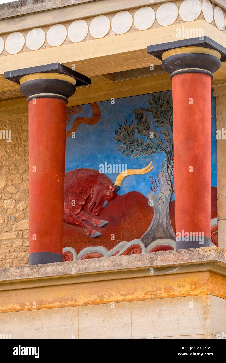 Pillars and bull fresco after Arthur Evans, bull with yellow horns, antique painting, parts of the Minoan temple complex of Knossos, Palace of Knossos, Knossos ancient city, Heraklion, Knossos, Crete, Greece, Europe Stock Photo