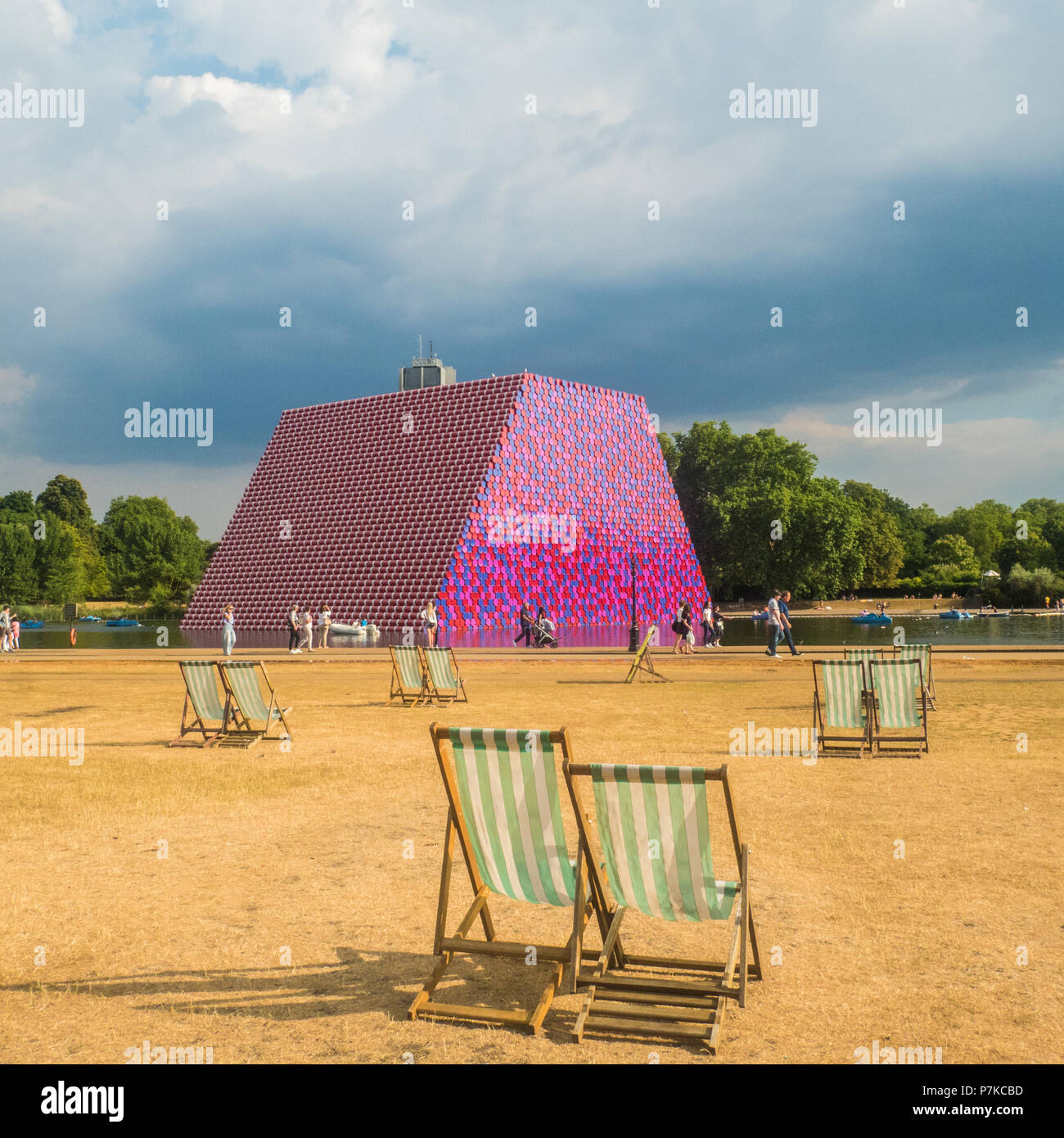 The 20 metre high 'Mastaba' sculpture by artist Christo on Serpentine Lake in London. The structure consists of over 7500 painted barrels Stock Photo