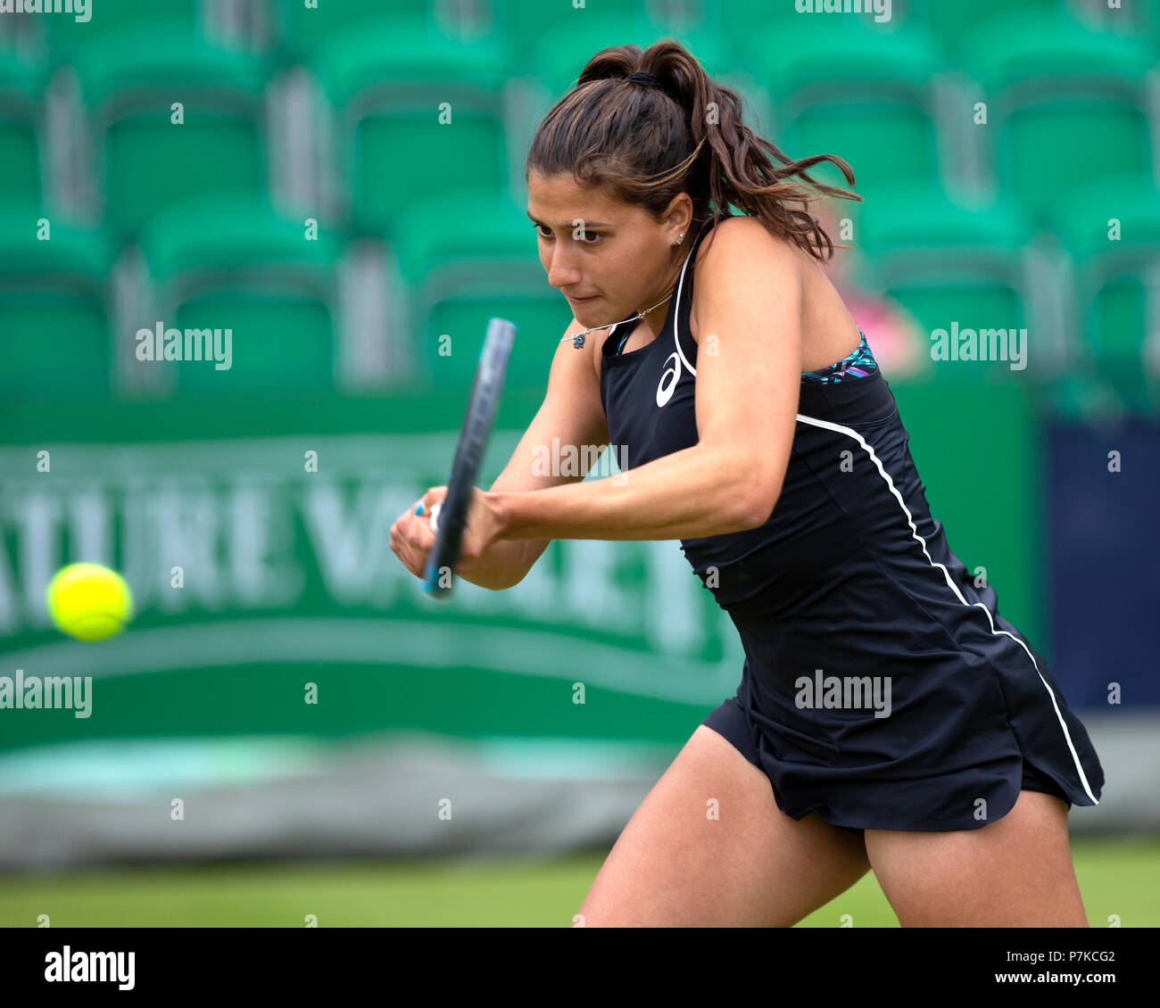 Jaimee Fourlis, professional tennis player from Australia, hits a shot during a match. Stock Photo