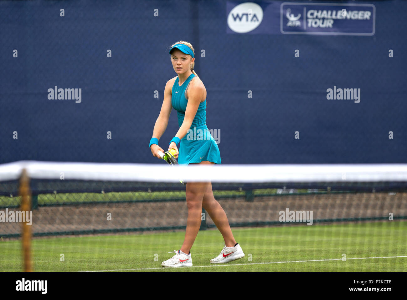 British tennis player Katie Swan prepares to serve during a match. Stock Photo