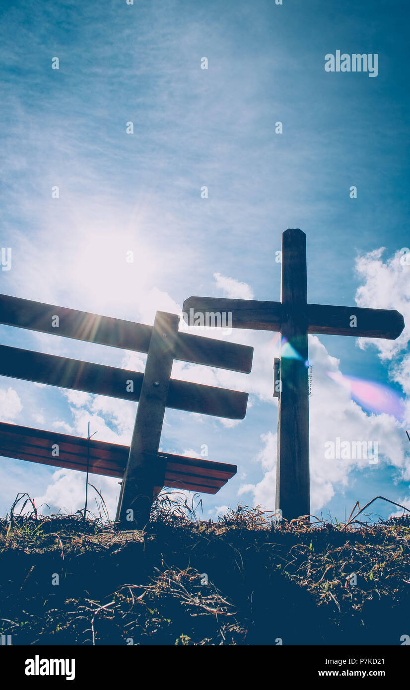 Bench, cross, backlight Stock Photo Alamy