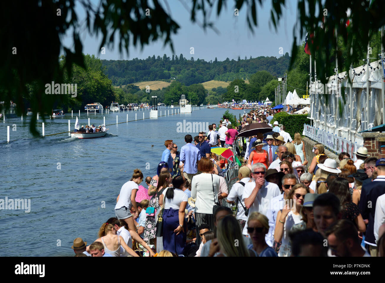 Henley Royal Regatta, Henley-On-Thames, UK. 6th July 2018. The third day of the Henley Royal Regatta took place on a stunning day in the Thames Valley.  The banks of the River Thames were packed with spectators enjoying one of the social events of the summer together with watching some of the worlds best rowers.Credit Wendy Johnson/Alamy Live News Stock Photo