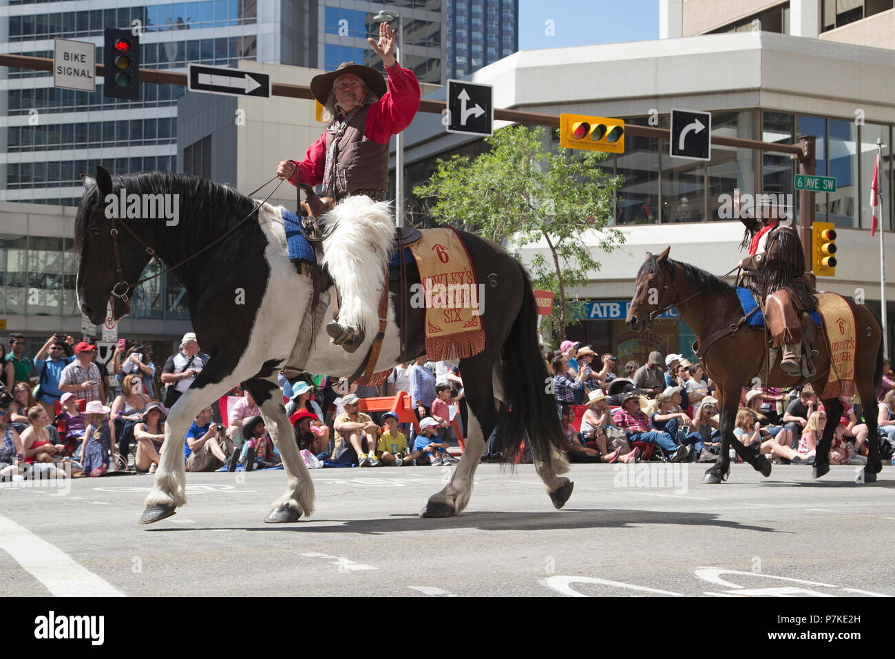 Calgary, Canada. 6th July, 2018.  Cowboys ride in the Calgary Stampede Parade. The parade through downtown kicks off the Calgary Stampede each year. Rosanne Tackaberry/Alamy Live News Stock Photo