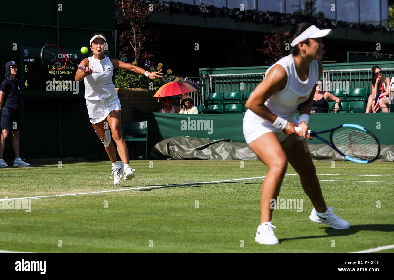 London, UK. 6th July, 2018. Peng Shuai (L) of China and Latisha Chan of Chinese Taipei compete during the women's doubles second round match against Abigail Spears of the United States and Alicja Rosolska of Poland at the Wimbledon Championships 2018 in London, Britain on July 6, 2018. Abigail Spears and Alicja Rosolska won 2-0. Credit: Tang Shi/Xinhua/Alamy Live News Stock Photo