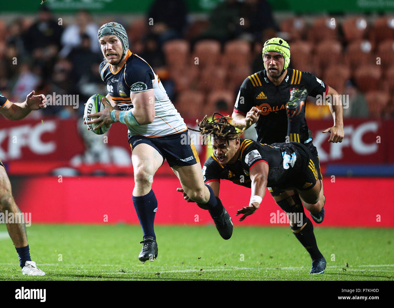 7th 2018, FMG Stadium Waikato, Hamilton, New Zealand; Super Rugby, Chiefs versus Brumbies; Brumbies flanker David Pocock beats the tackle of Chiefs reserve Johnny Faauli Credit Action Plus Sports Images/Alamy Live News