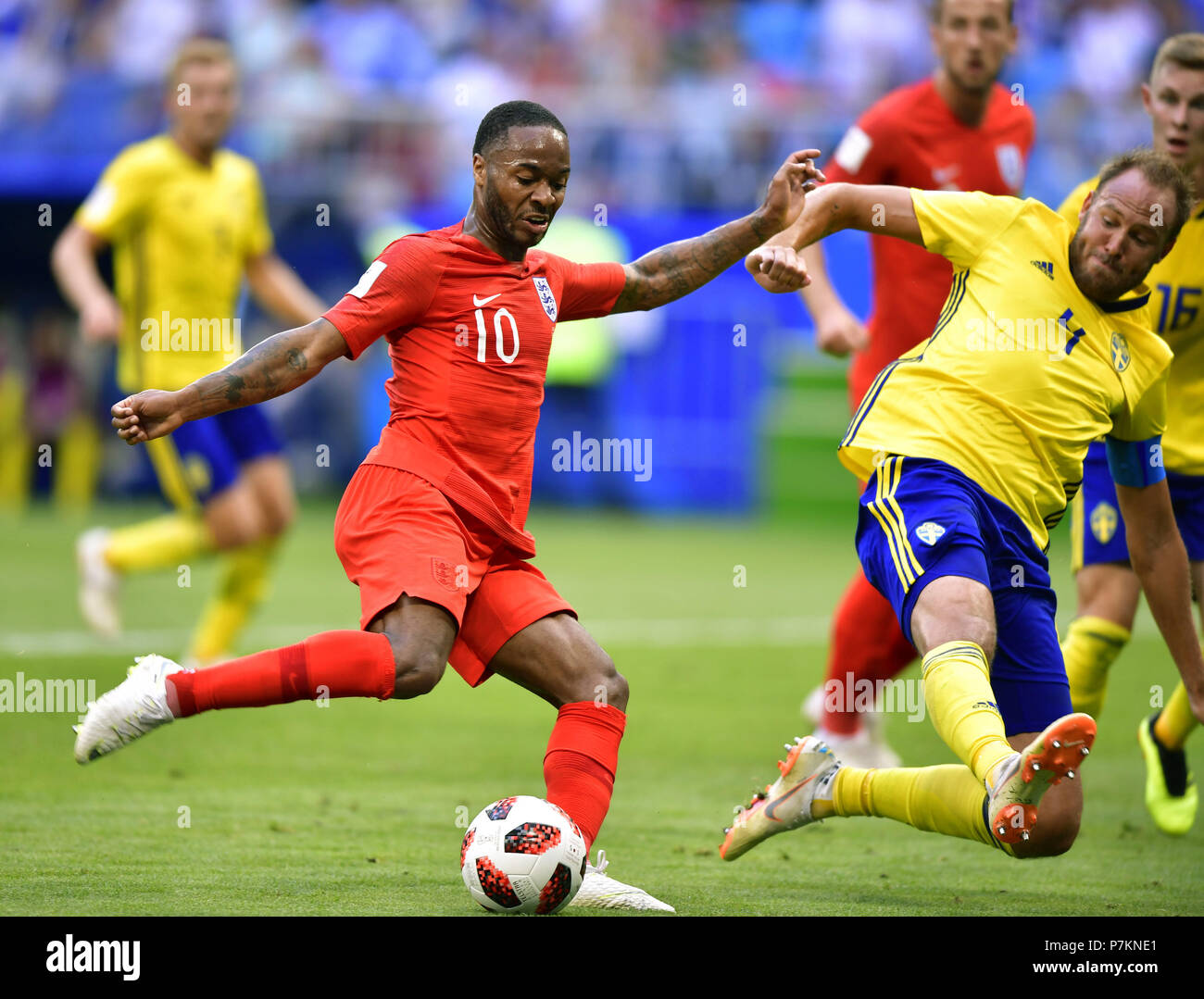 Samara, Russia. 7th July, 2018. Raheem Sterling (L) of England shoots during the 2018 FIFA World Cup quarter-final match between Sweden and England in Samara, Russia, July 7, 2018. Credit: Chen Yichen/Xinhua/Alamy Live News Stock Photo