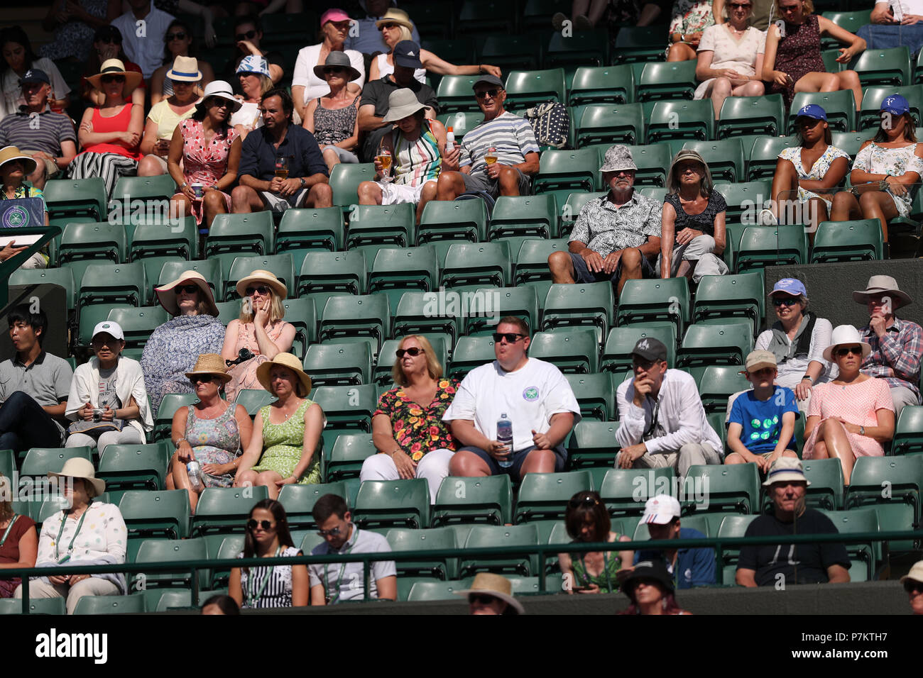 London, UK. 7th July 2018. The Wimbledon Tennis Championships, Day 6; May empty seats on centre court due to England playing their World Cup football match at the same time in Russia Credit: Action Plus Sports Images/Alamy Live News Credit: Action Plus Sports Images/Alamy Live News Credit: Action Plus Sports Images/Alamy Live News Stock Photo