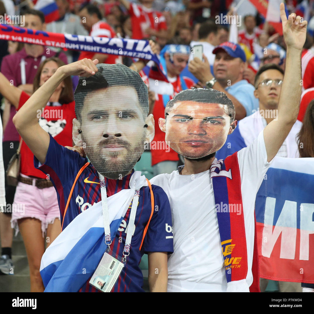 Sochi, Russia. 7th July, 2018. Fans with masks of Portugal's Cristiano Ronaldo (R) and Argentina's Lionel Messi are seen prior to the 2018 FIFA World Cup quarter-final match between Russia and Croatia in Sochi, Russia, July 7, 2018. Credit: Cao Can/Xinhua/Alamy Live News Stock Photo