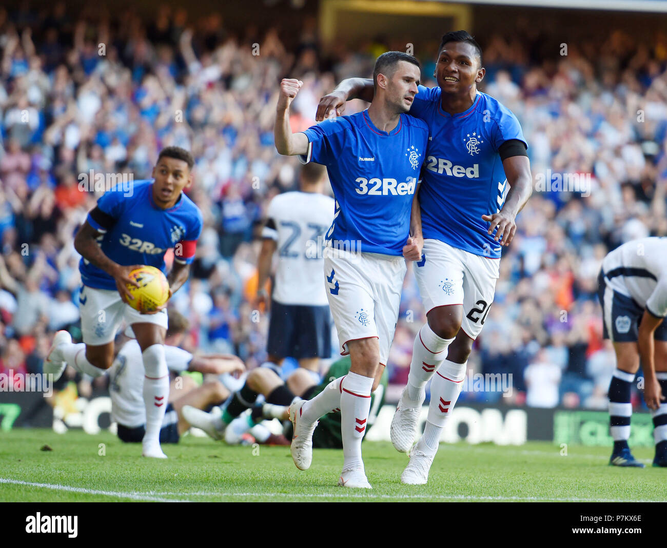 Rangers Jamie Murphy (left) celebrates scoring his side's first goal of ...
