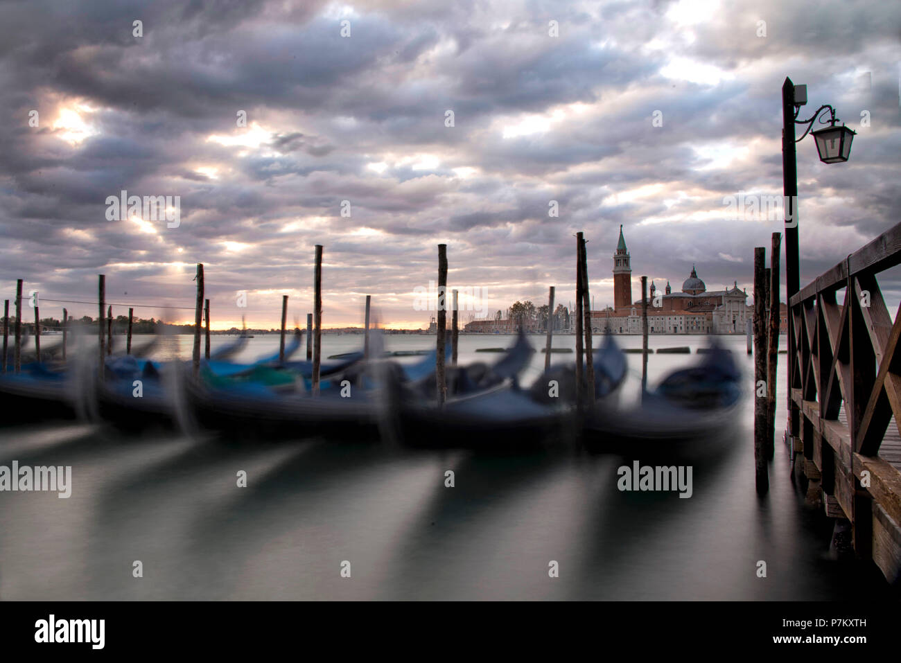 Gondolas in the lagoon of Venice, sunrise, Italy Stock Photo - Alamy