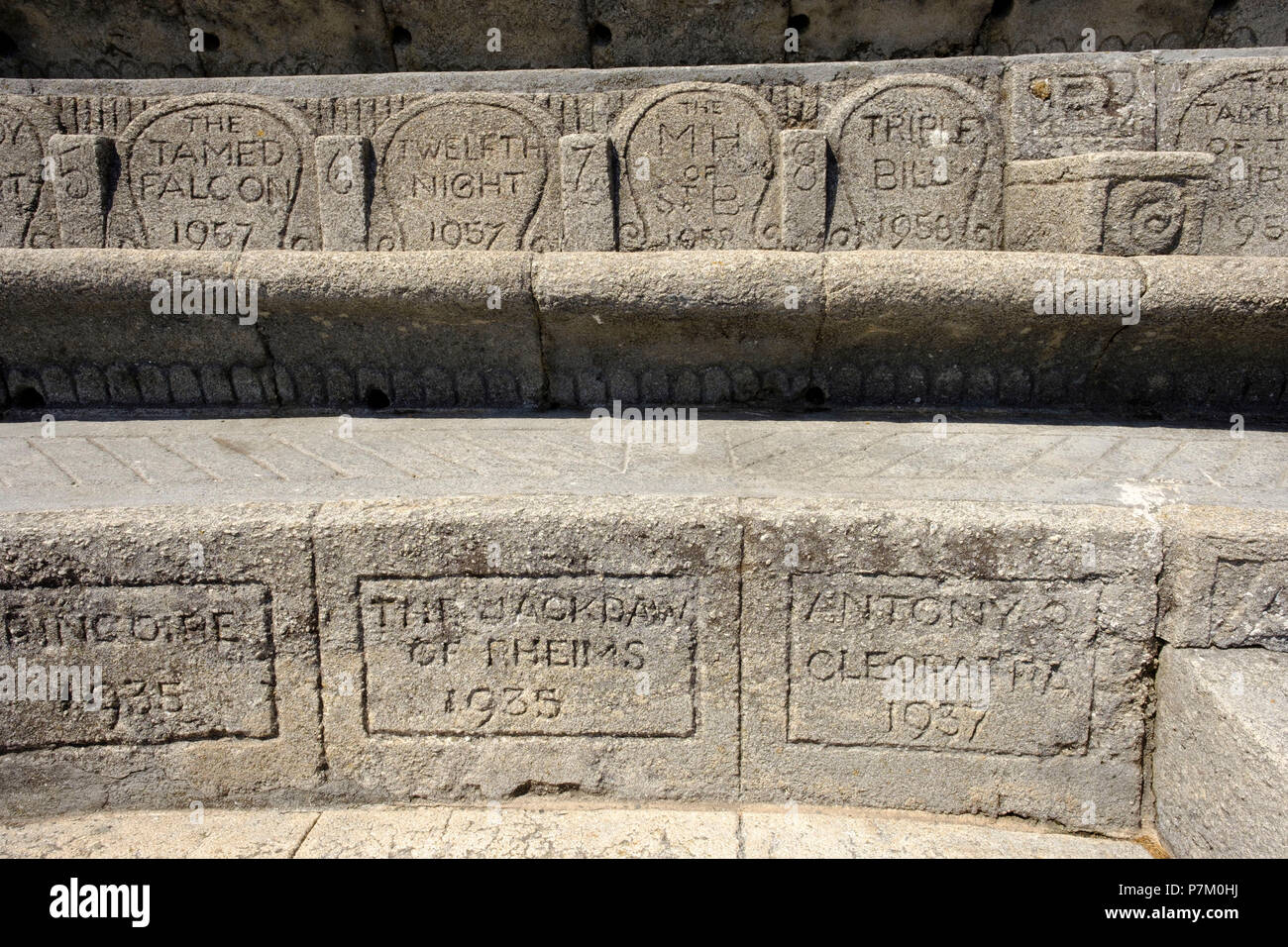 labeled seatbacks, Minack Theater, open air theater, Porthcurno, Cornwall, England, UK Stock Photo