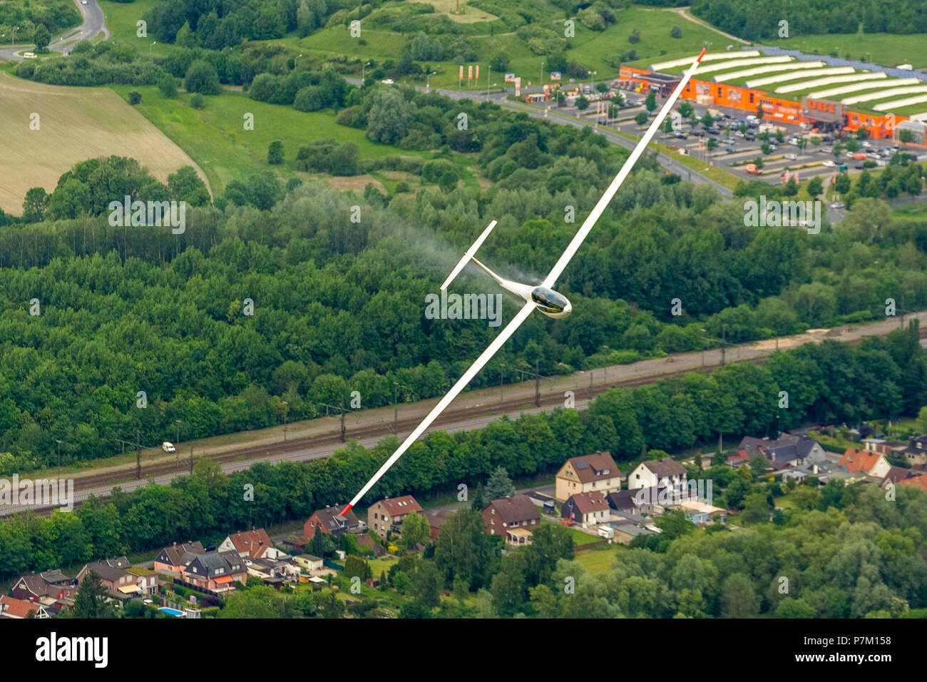 Aerial photo, gliding, single-seat performance glider DG 300 dumping water ballast, Hamm, Ruhr area Stock Photo