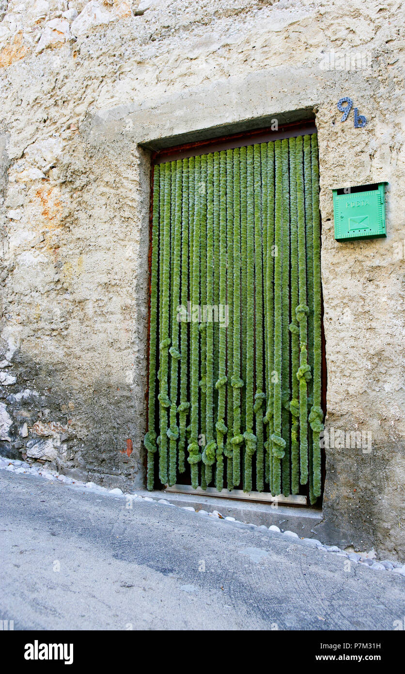 Croatia, Kvarner Bay, Krk Island, Baska, old town, House entrance, Door curtain, Stock Photo