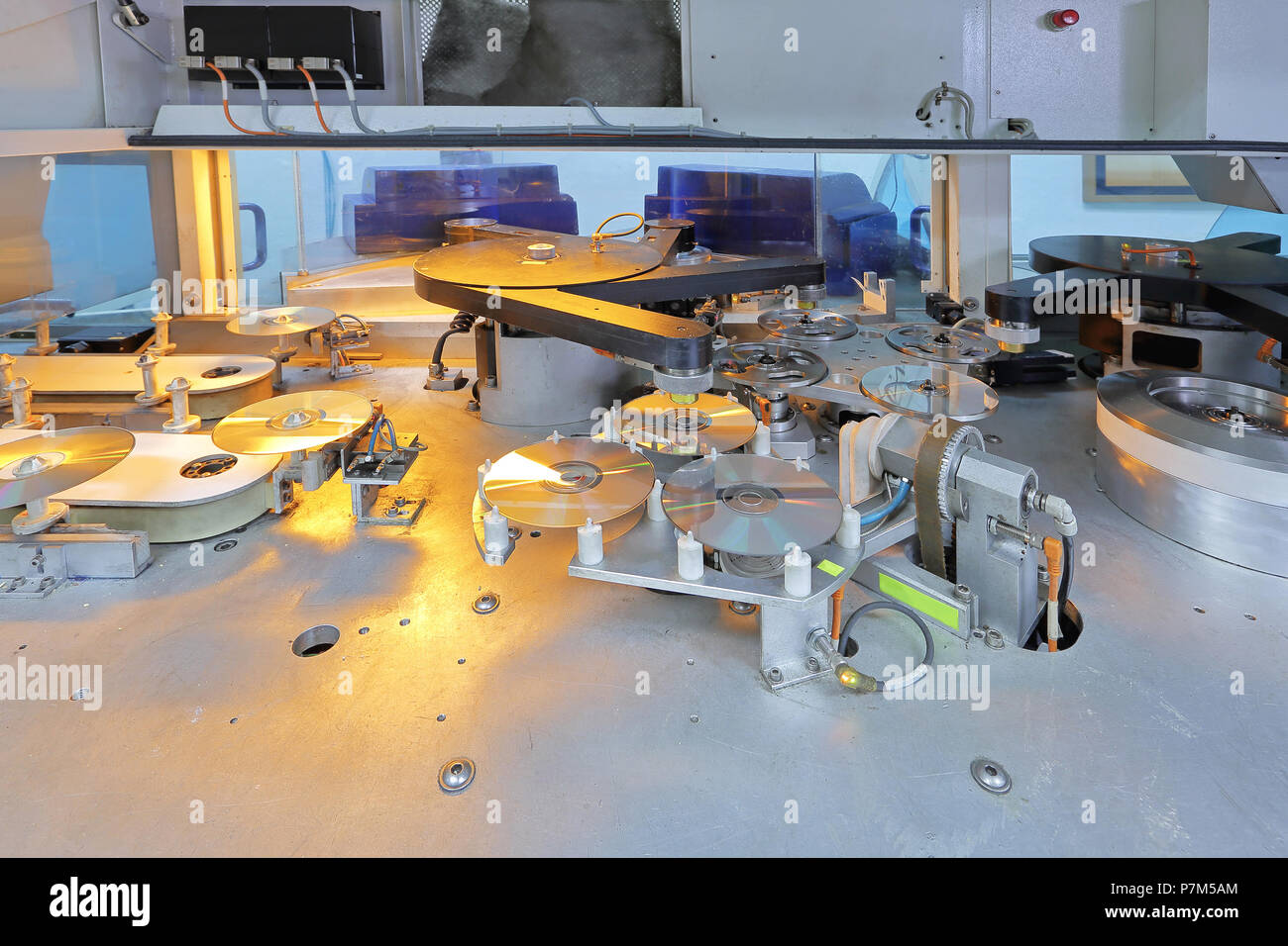 Compact disc and DVD manufacturing machine Stock Photo Alamy
