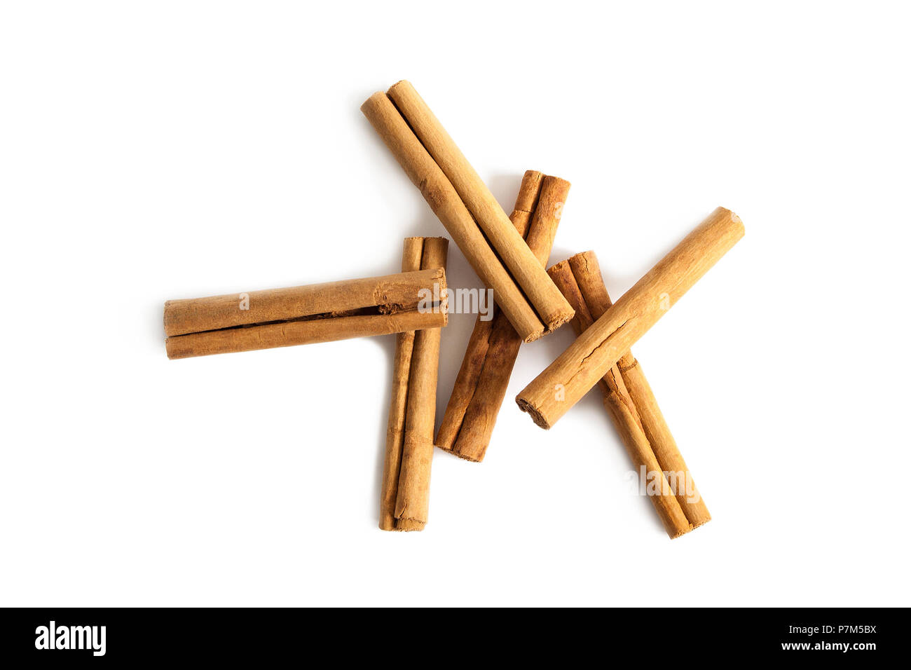 Cinnamon sticks from above isolated on a white background Stock Photo