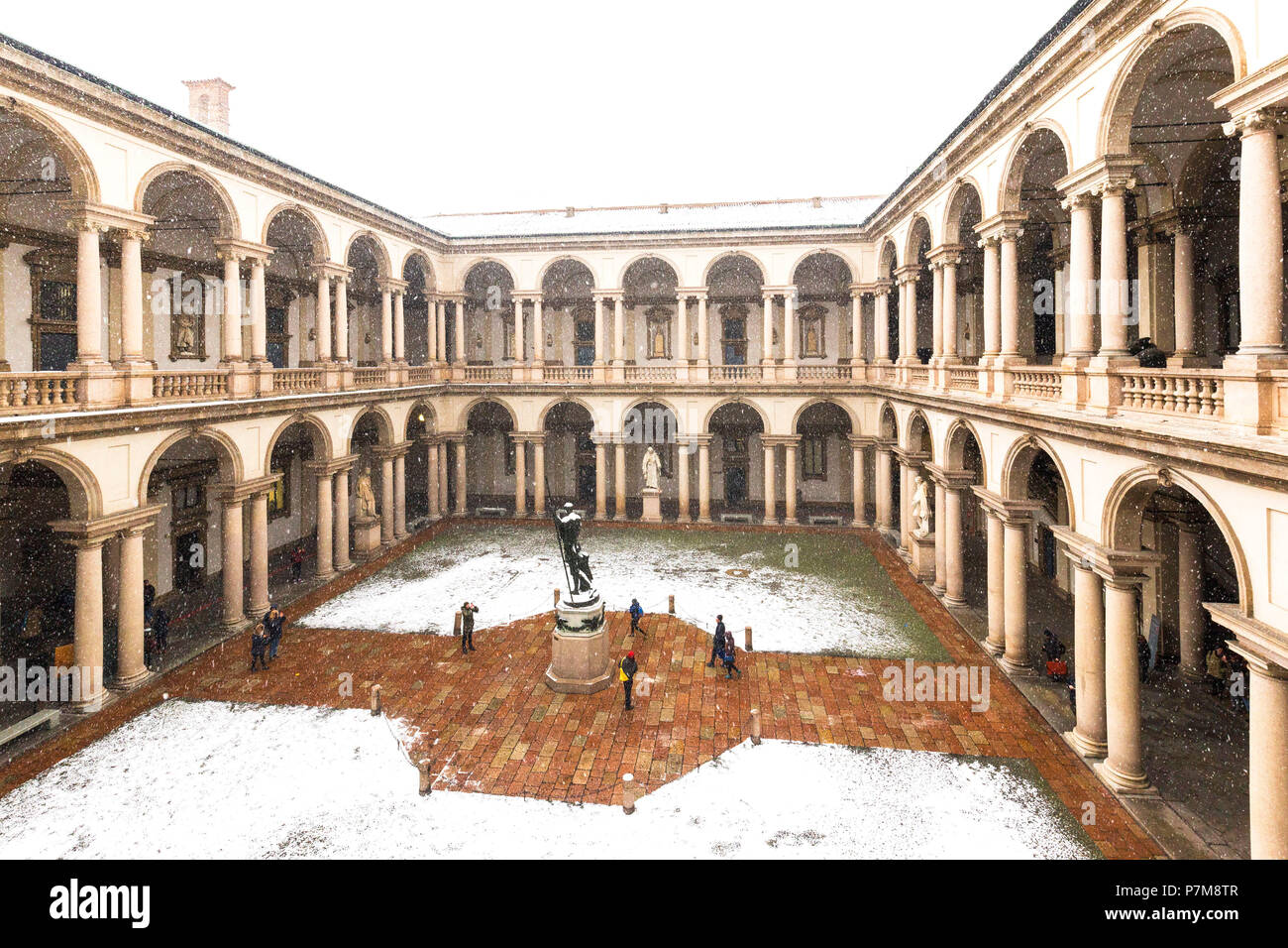Courtyard of honor of the Palace of Brera during snowfall, Milan, Lombardy, Northern Italy, Italy, Stock Photo
