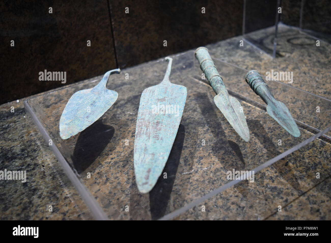 Four ancient metal spearheads from the Middle East at the Qazvin museum of Iran Stock Photo