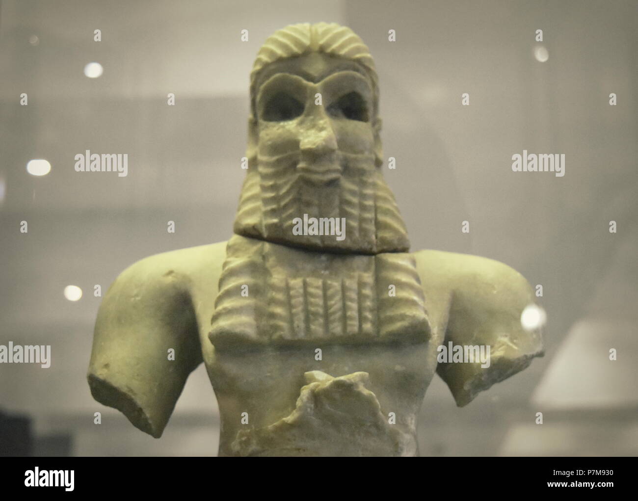 Ancient Babylonian king statue from Mesopotamia in the history museum of Qazvin, Iran Stock Photo