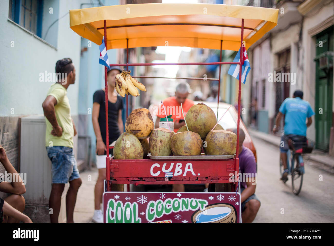 A cart selling coconut water on a hot day in Havana, Cuba Stock Photo