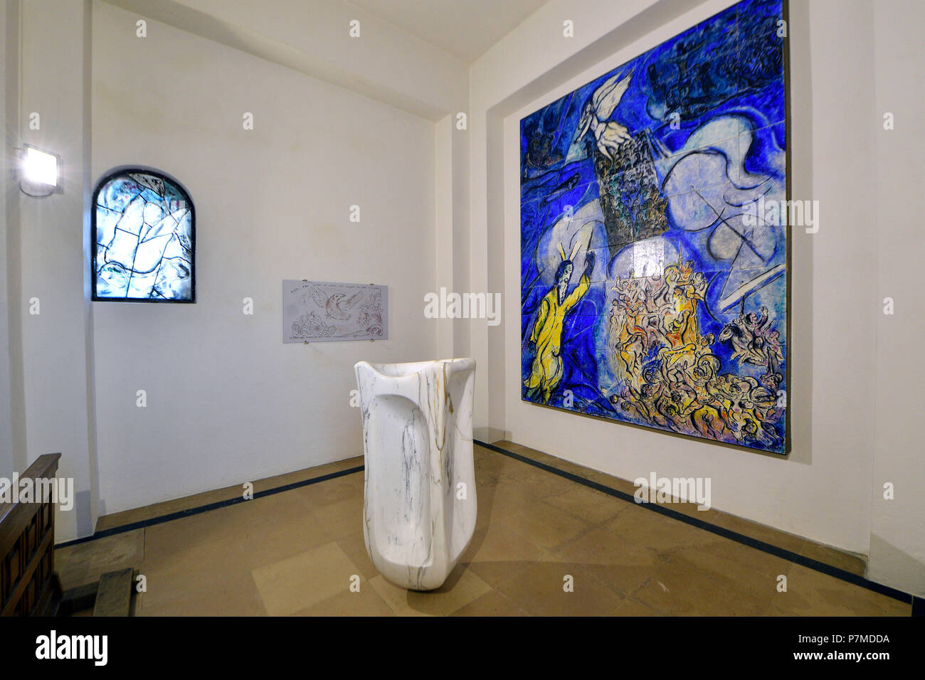 France, Haute Savoie, plateau d'Assy, Passy, Notre Dame de Toute Grace church, Baptistry of Chagall, ceramics Red Sea crossing of Marc Chagall, In front of the mosaic, baptismal tank of Carlo Sergio Signori in Carrara marble Stock Photo